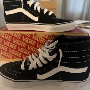 Never worn Vans Classic Black and White High-Tops